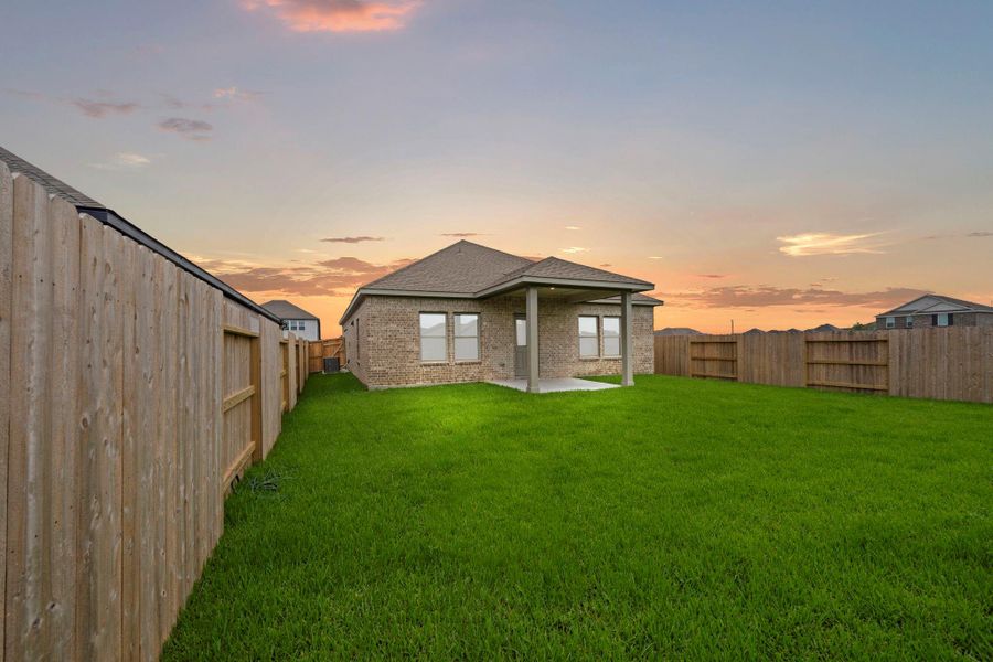 Exterior details and patio area of a home in Windrose Green, Angleton (Image 4). Exterior details and patio area of a home in Windrose Green, Angleton (Image 4).