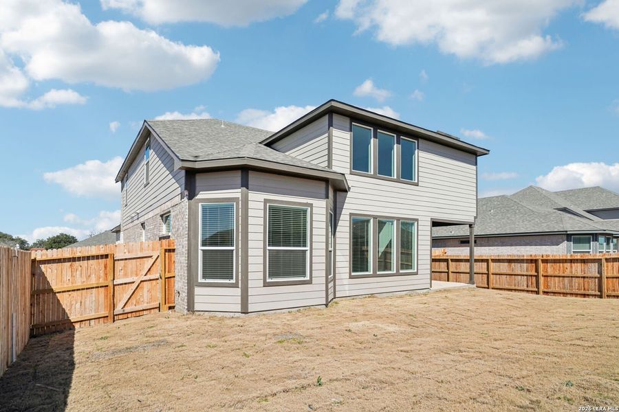 Exterior details and patio area of a home in Carmel Ranch, Schertz (Image 27).