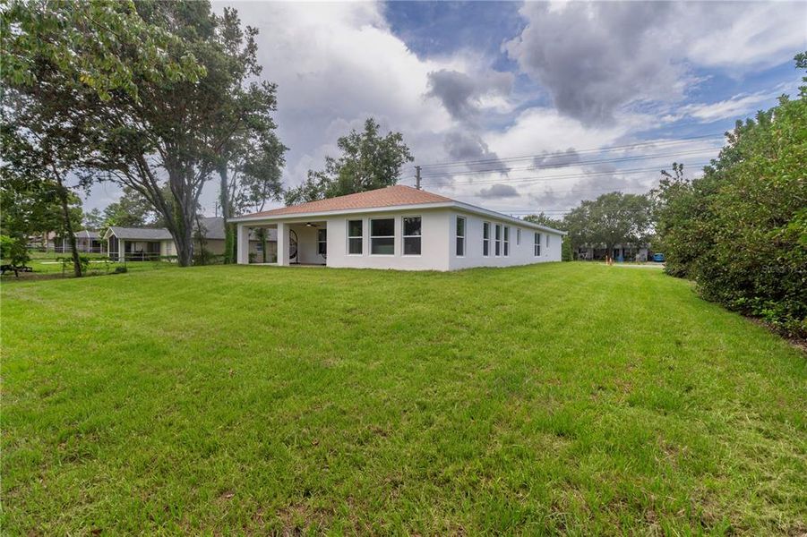 Front exterior of a new home in , Spring Hill, FL, highlighting curb appeal (Image 33).
