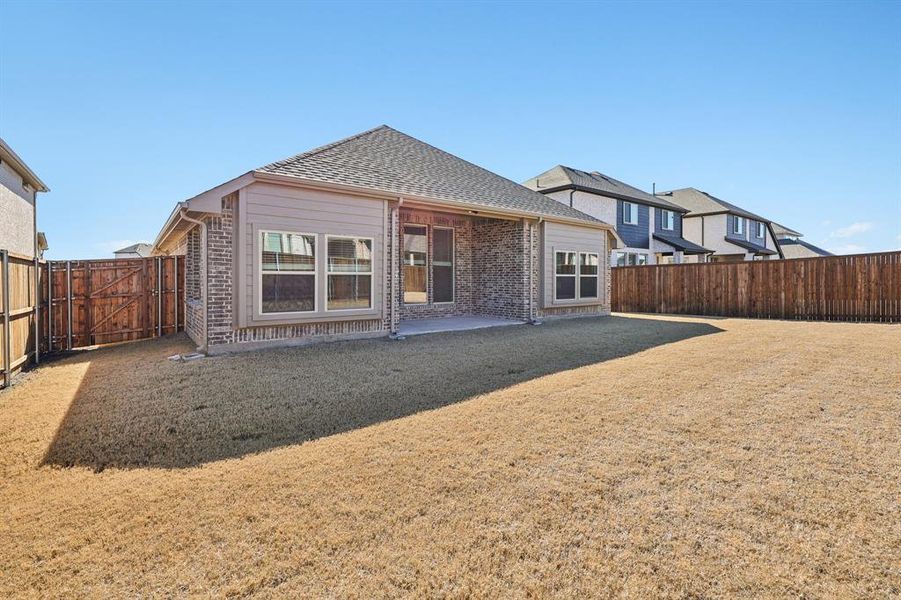 Exterior details and patio area of a home in ArrowBrooke, Aubrey (Image 23). Exterior details and patio area of a home in ArrowBrooke, Aubrey (Image 23).