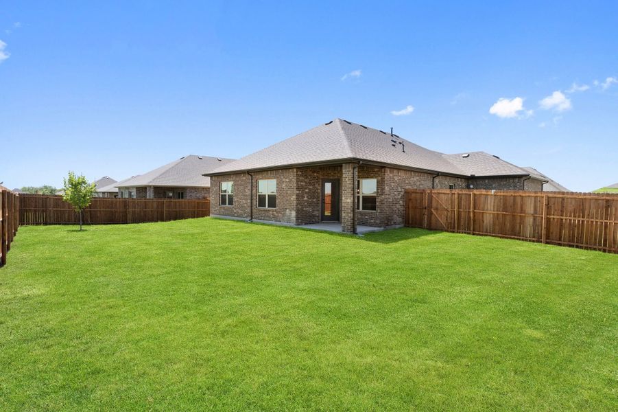 Front exterior of a new home in Waverly Estates, Nevada, TX, highlighting curb appeal (Image 76).