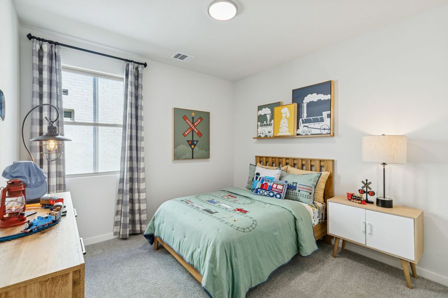 Bedroom in a Nicholson Ranch Magnolia Model Home in Lavon TX by Trophy Signature Homes