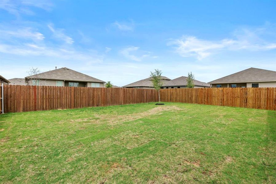Exterior details and patio area of a home in Highlands at Chapel Creek, Fort Worth (Image 3).