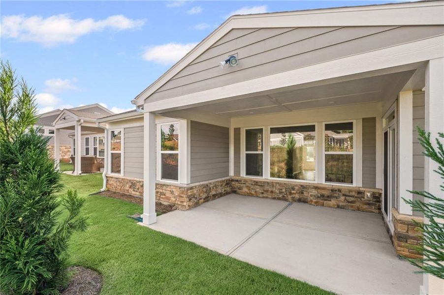Front exterior of a new home in Laurel Farms, Dallas, GA, highlighting curb appeal (Image 30). Front exterior of a new home in Laurel Farms, Dallas, GA, highlighting curb appeal (Image 30).