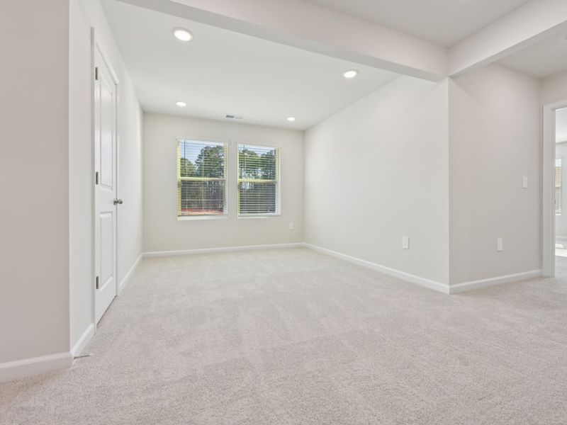 Spacious, unfurnished interior of a new home in The Rows at Buffaloe Reserve, Raleigh (Image 11). Spacious, unfurnished interior of a new home in The Rows at Buffaloe Reserve, Raleigh (Image 11).
