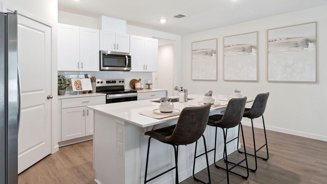 Furnished interior view inside a new home in Crossroads at Kelly Park, Apopka (Image 6).