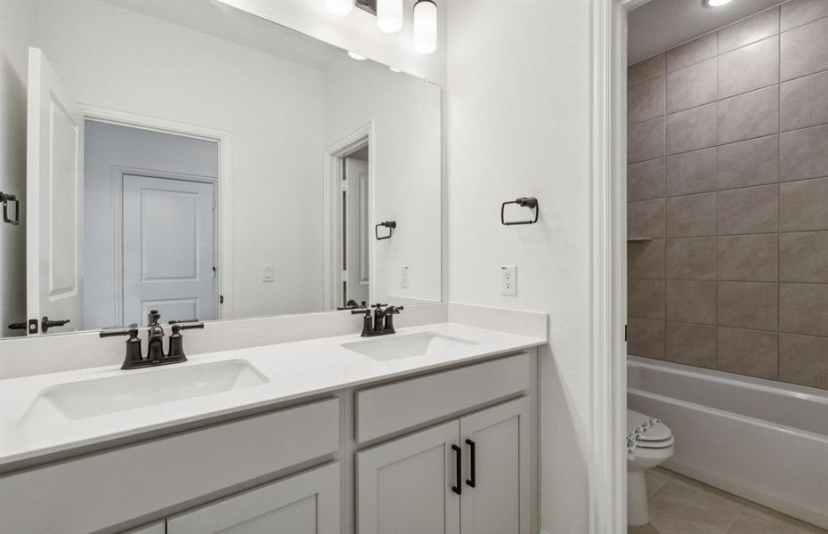 Upgraded secondary bathroom*real home pictured