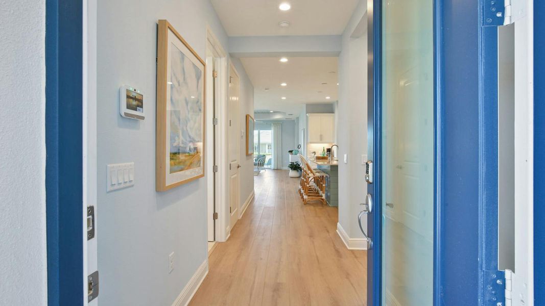 Furnished interior view inside a new home in Palm Grove Real Estate and Homes for Sale in Lakewood Ranch, FL - Neal Communities, Lakewood Ranch (Image 6).