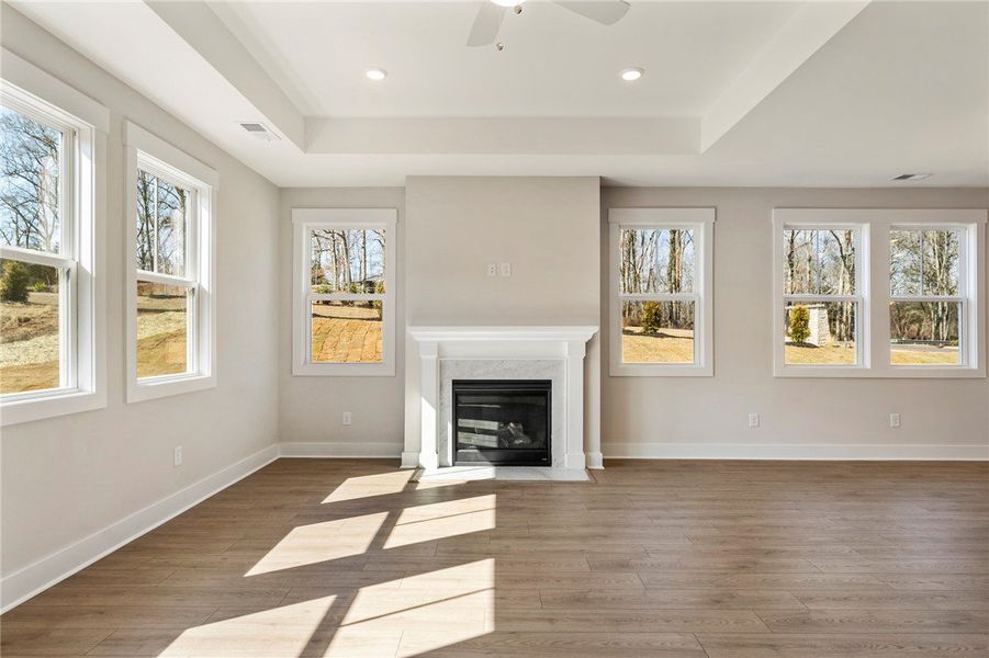 This living area features a warm fireplace, abunda This living area features a warm fireplace, abunda