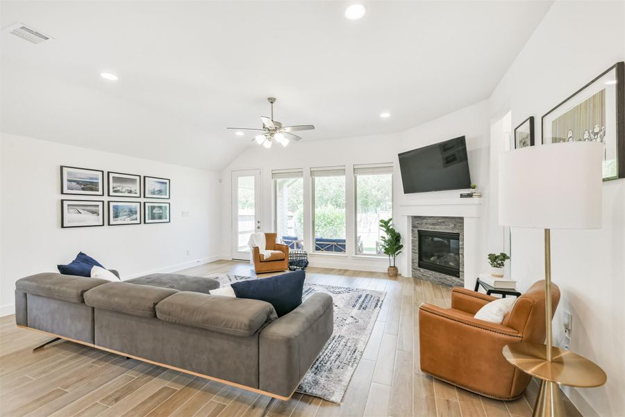 This spacious open floor plan is filled with light and views of the landscaped backyard. This spacious open floor plan is filled with light and views of the landscaped backyard.