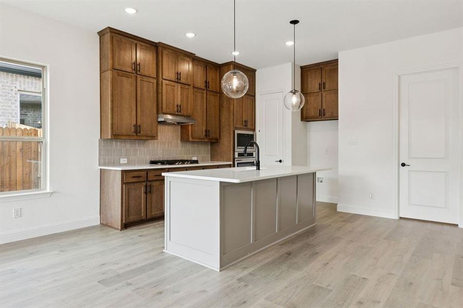 Furnished interior view inside a new home in Country Lakes, Denton (Image 8).