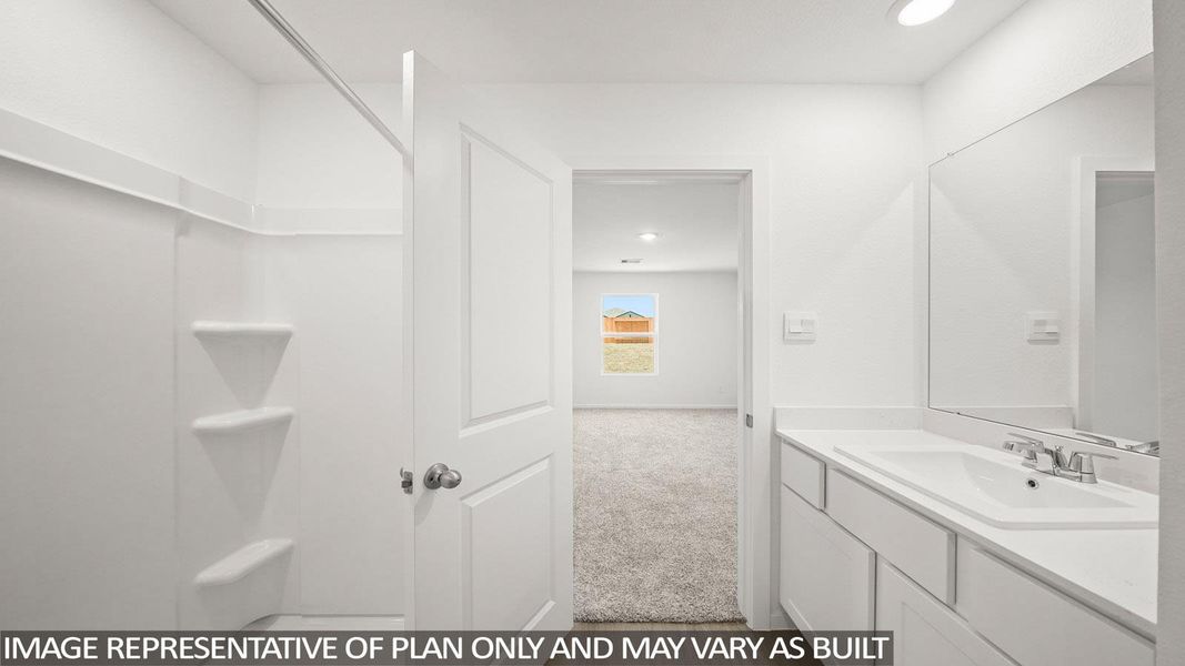Full bath with vanity, light carpet, a shower, and recessed lighting