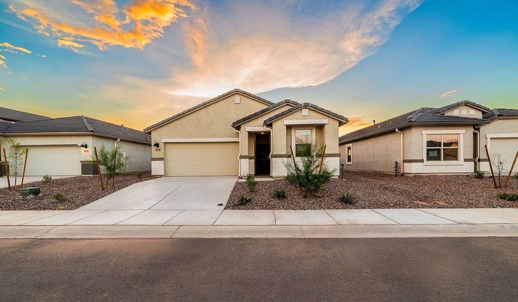 Front exterior of a new home in Saguaro Bloom, Marana, AZ, highlighting curb appeal (Image 2).