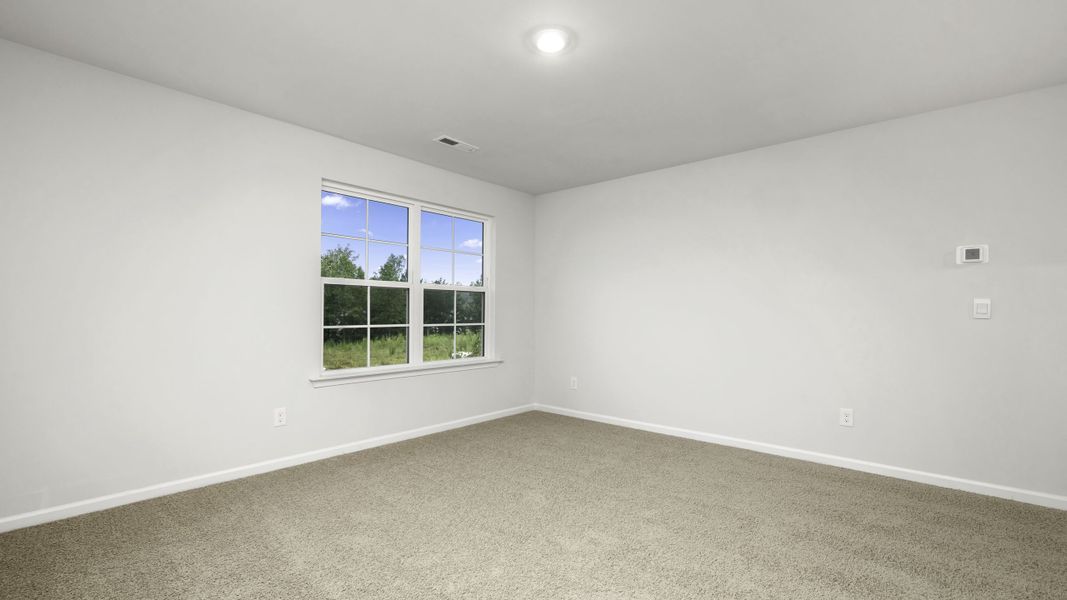 Representative unfurnished interior of a home built from the Manning by D.R. Horton in Chandler Pointe, Rural Hall (Image 23).