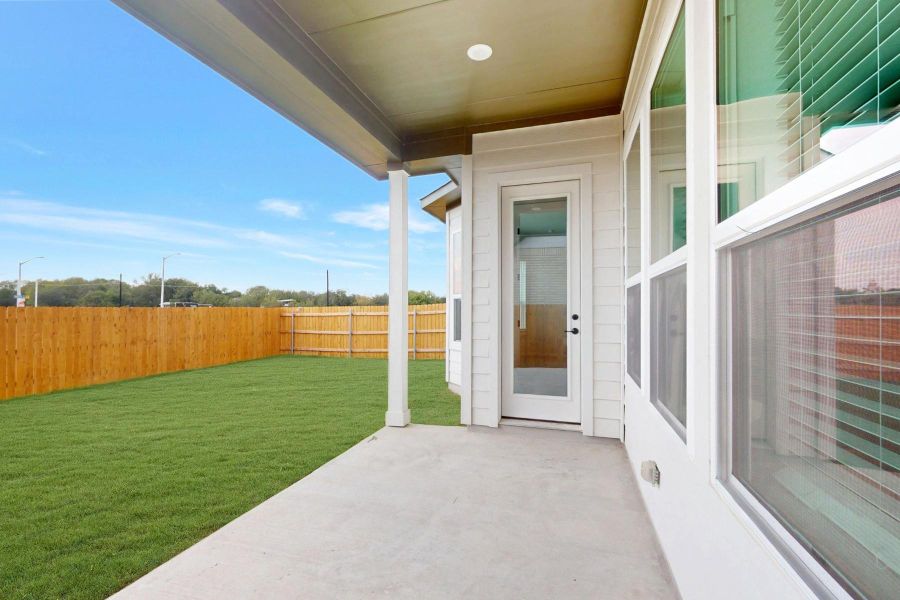Exterior details and patio area of a home in Estancia West, Manchaca (Image 22). Exterior details and patio area of a home in Estancia West, Manchaca (Image 22).