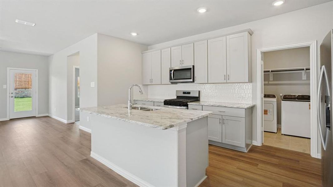 Photo is not of the actual home, but is an inspirational photo of builder’s model home and may depict options, furnishings, and/or decorator features that are not included.