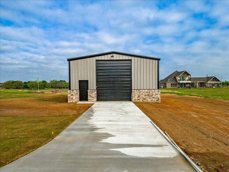 Front exterior of a new home in , Granbury, TX, highlighting curb appeal (Image 24). Front exterior of a new home in , Granbury, TX, highlighting curb appeal (Image 24).