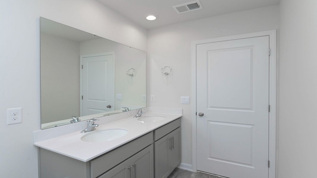 Representative furnished interior of a home built from the ROBIE by D.R. Horton in Ferry Grove, Lexington (Image 15).