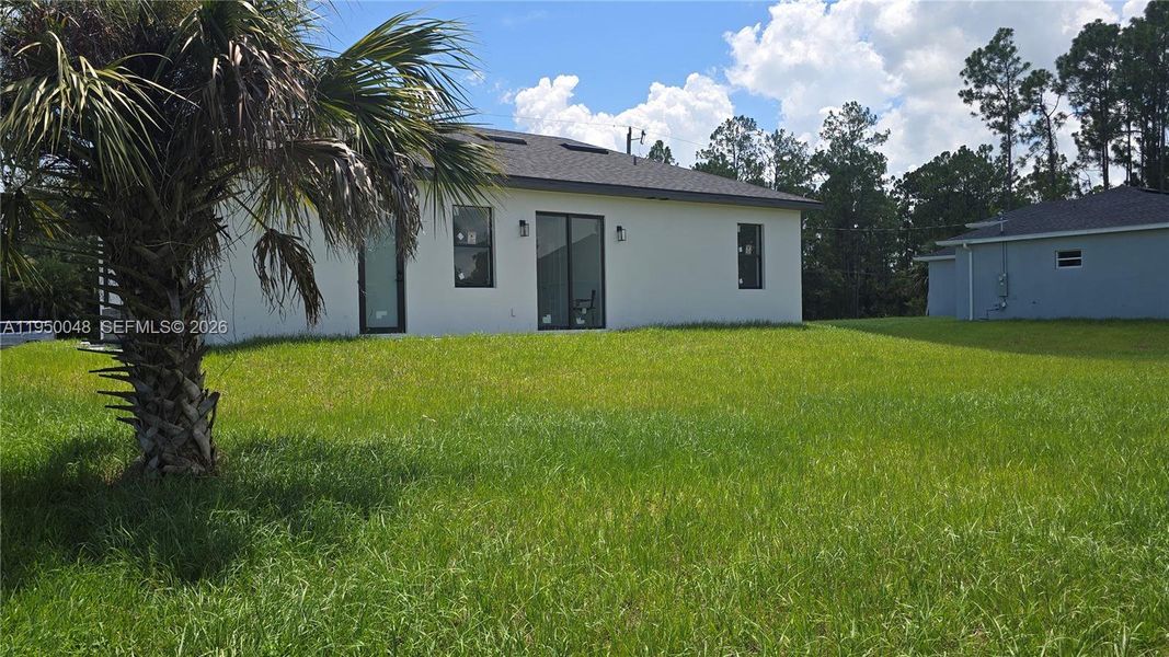 Exterior details and patio area of a home in , Lehigh Acres (Image 3).