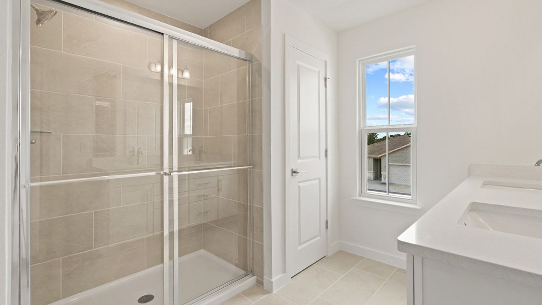 Highbourne Second Floor Primary en Suite Bath by DRB Homes in Willowbrook North located in Winter Haven, FL. Highbourne Second Floor Primary en Suite Bath by DRB Homes in Willowbrook North located in Winter Haven, FL.