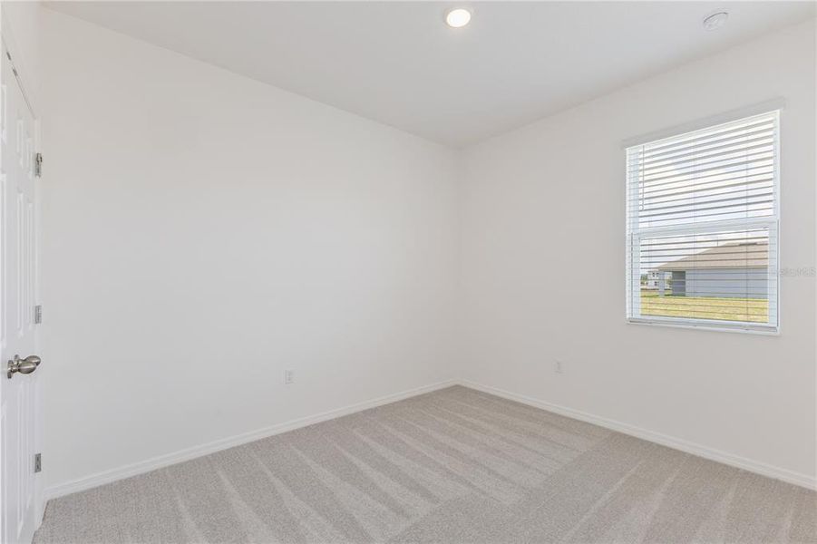 Spacious, unfurnished interior of a new home in Highfield at Twisted Oaks, Wildwood (Image 11).