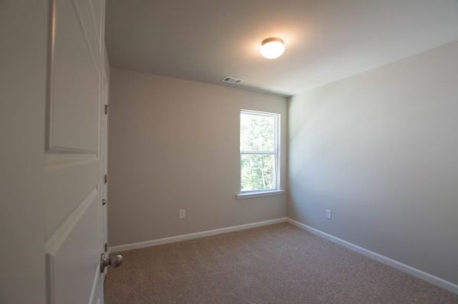 Representative unfurnished interior of a home built from the Laurel by Piedmont Residential in The Reserve at Willow Oaks, Canton (Image 27).