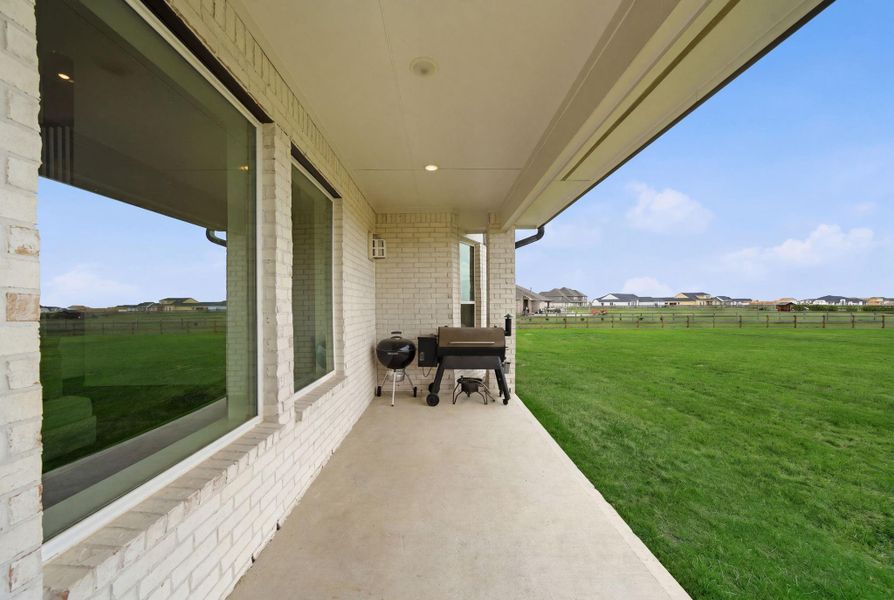 Exterior details and patio area of a home in , Waller (Image 3).