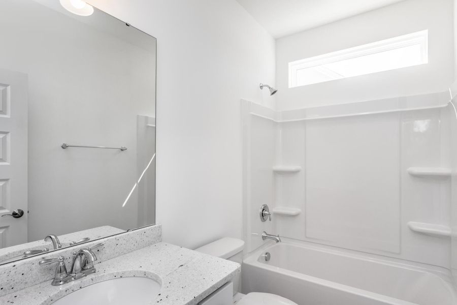 Furnished interior view inside a new home in The Enclave at Hidden Lake - 55+ Community, Youngsville (Image 13).