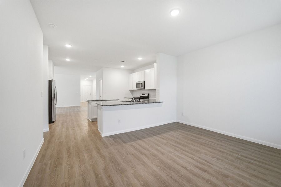 Spacious, unfurnished interior of a new home in The Canopies, Splendora (Image 27).