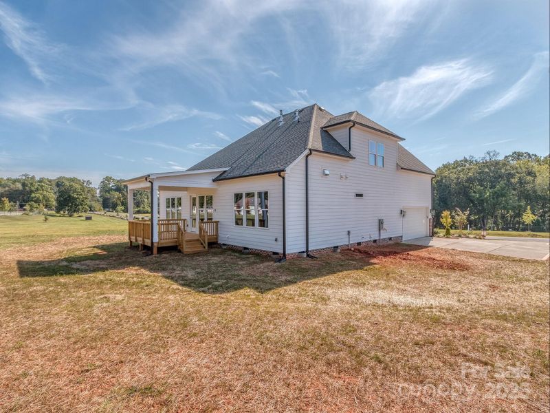 Front exterior of a new home in , Clover, SC, highlighting curb appeal (Image 1).