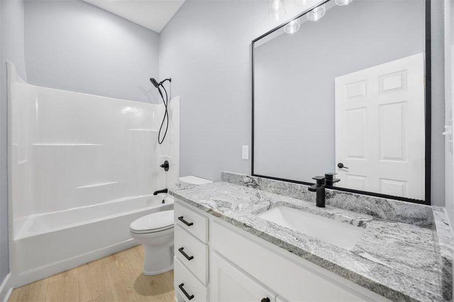 Furnished interior view inside a new home in , Ennis (Image 8).