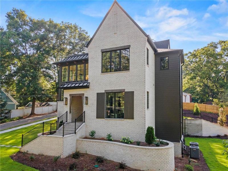 Front exterior of a new home in , Roswell, GA, highlighting curb appeal (Image 27). Front exterior of a new home in , Roswell, GA, highlighting curb appeal (Image 27).