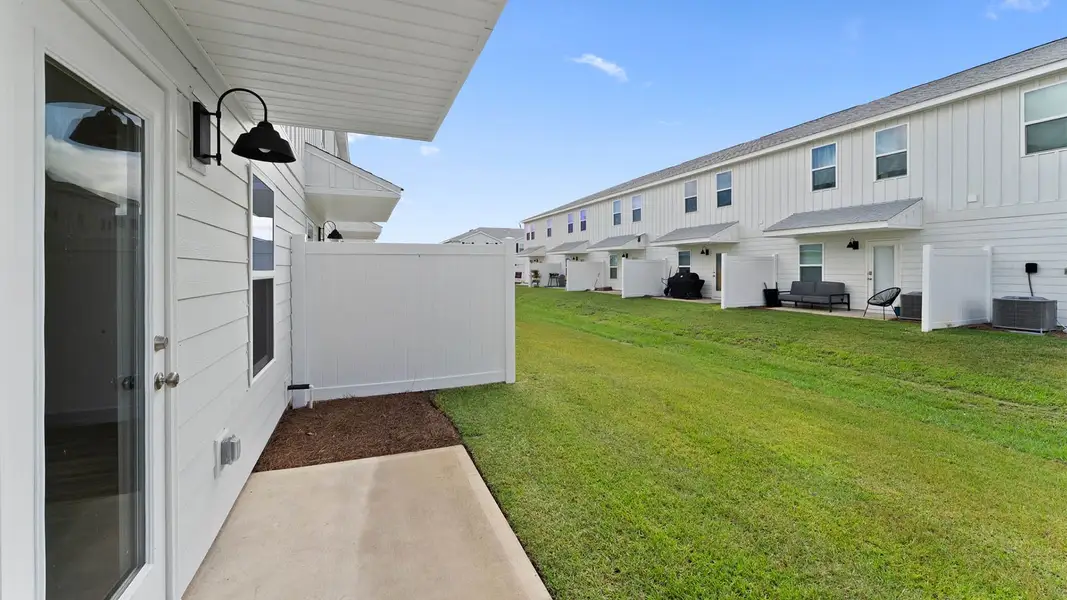 Exterior details and patio area of a home in Salt Creek at Mexico Beach, Mexico Beach (Image 4).