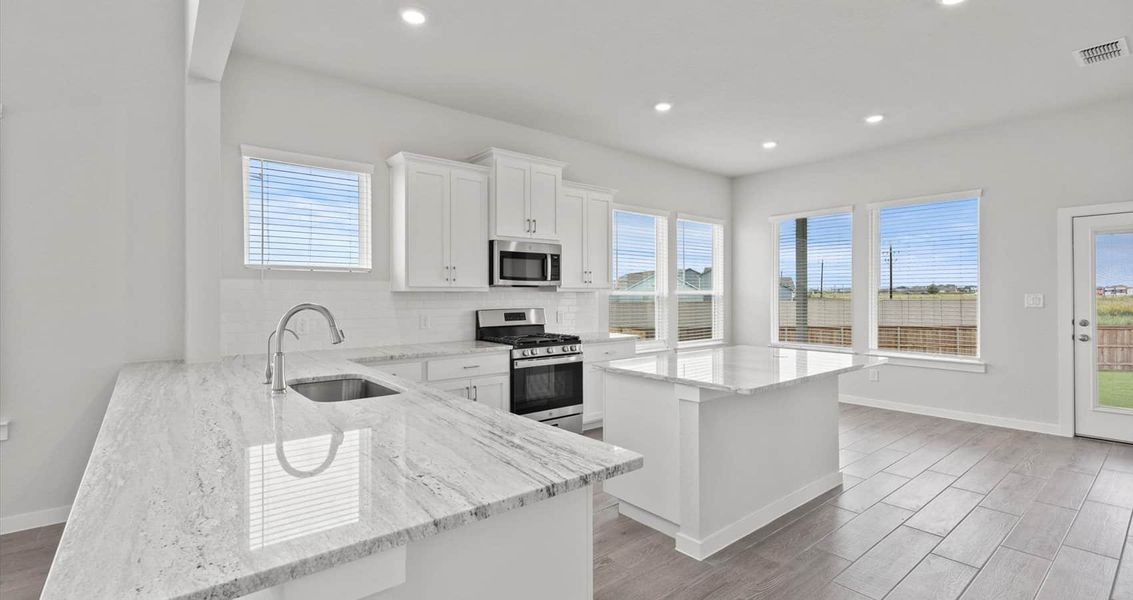 Furnished interior view inside a new home in Village at Three Oaks, Seguin (Image 3). Furnished interior view inside a new home in Village at Three Oaks, Seguin (Image 3).