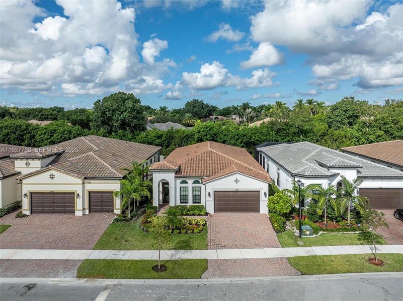 Front exterior of a new home in , Parkland, FL, highlighting curb appeal (Image 31). Front exterior of a new home in , Parkland, FL, highlighting curb appeal (Image 31).