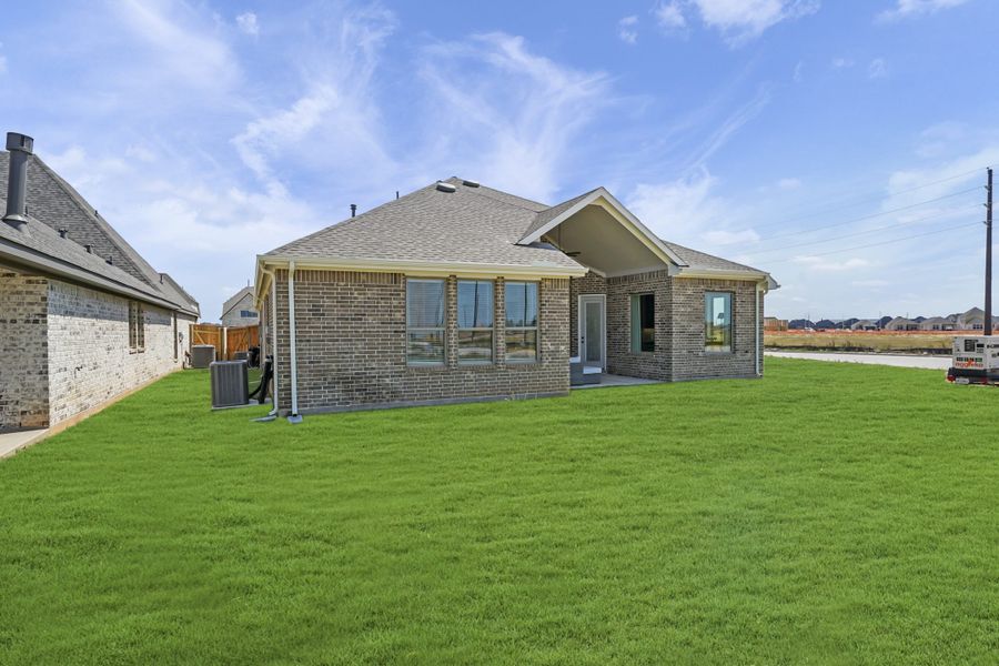 Exterior details and patio area of a home in Jordan Ranch, Fulshear (Image 25).