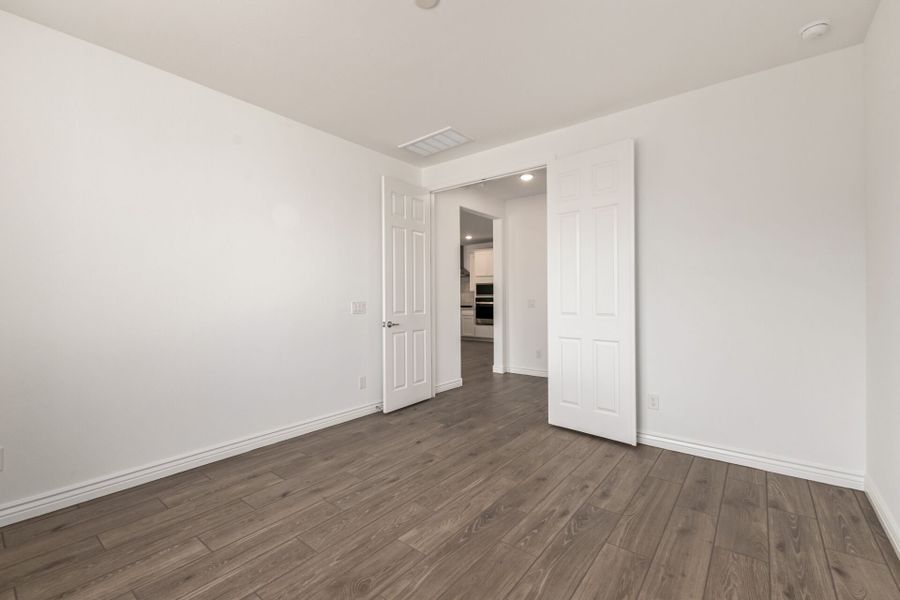 Spacious, unfurnished interior of a new home in Miravida, Surprise (Image 10).