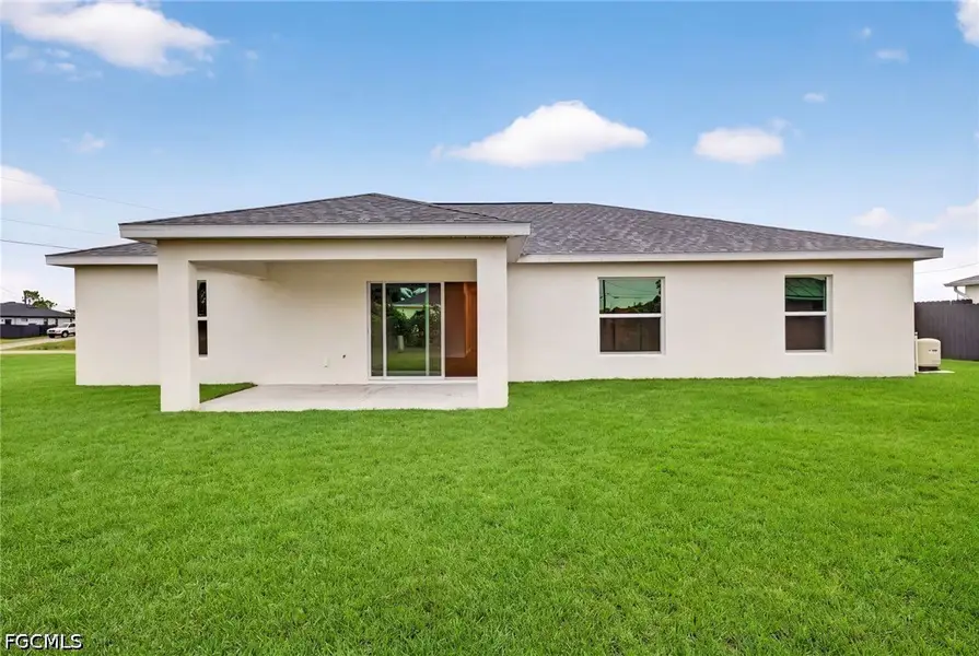 Exterior details and patio area of a home in Cape Coral, Cape Coral (Image 4).