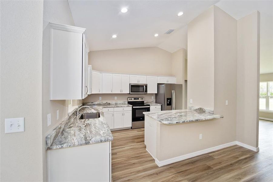 Furnished interior view inside a new home in , Dunnellon (Image 7).