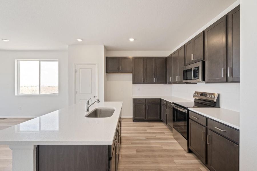 Furnished interior view inside a new home in Bennett Crossing Reserve, Bennett (Image 6).