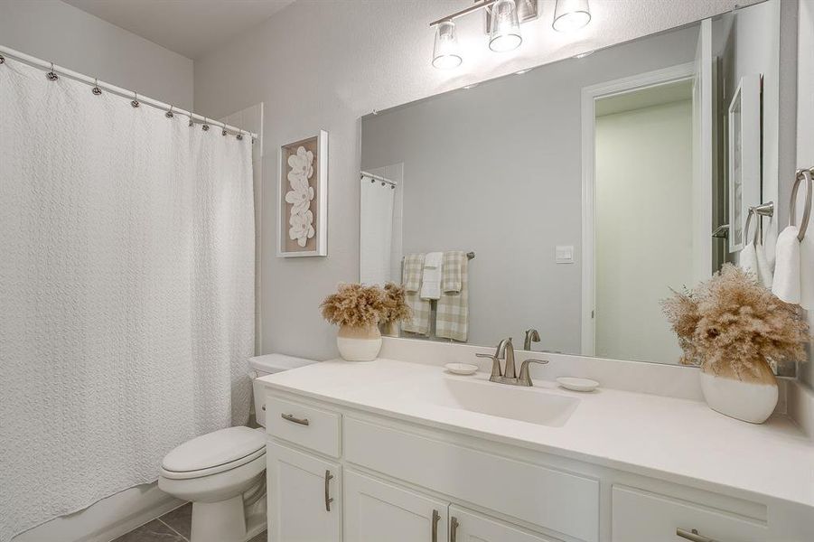 Furnished interior view inside a new home in M3 Ranch 60s, Mansfield (Image 29).