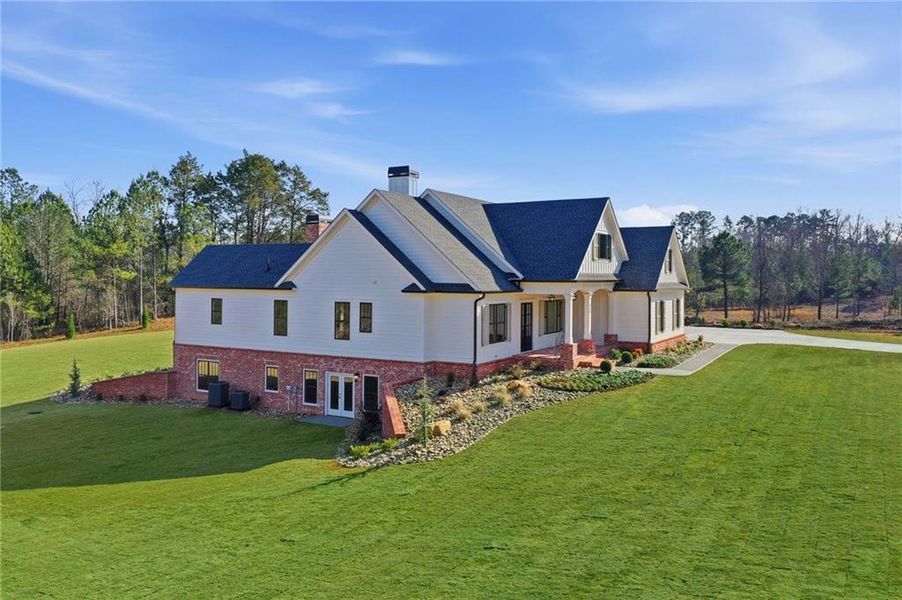 Front exterior of a new home in , White, GA, highlighting curb appeal (Image 32). Front exterior of a new home in , White, GA, highlighting curb appeal (Image 32).