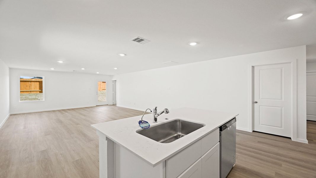 Representative furnished interior of a home built from the Carson by D.R. Horton in Lexington Heights, Willis (Image 6).