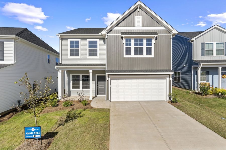 Front exterior of a new home in Mayfair Village, Spartanburg, SC, highlighting curb appeal (Image 1).