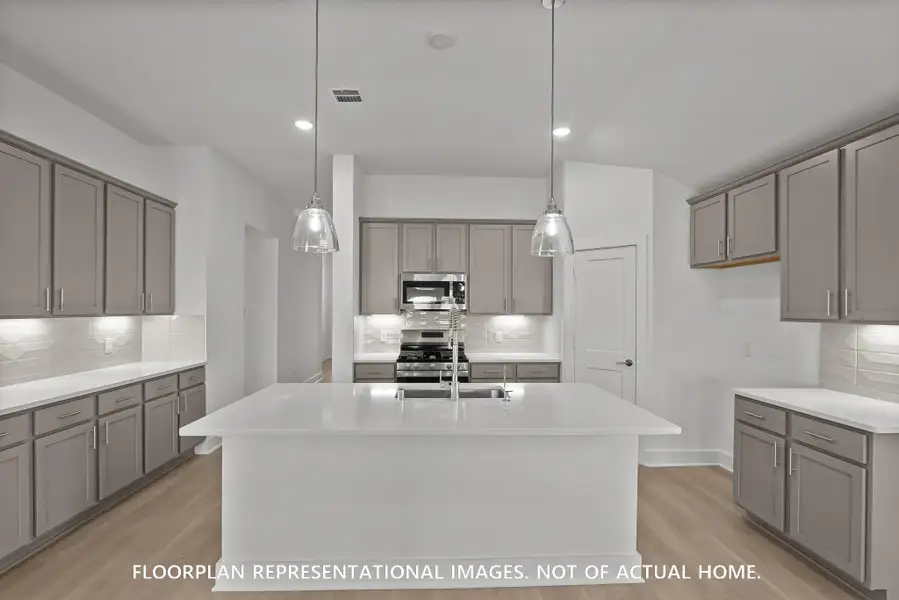 Furnished interior view inside a new home in Pinewood at Grand Texas, New Caney (Image 4).