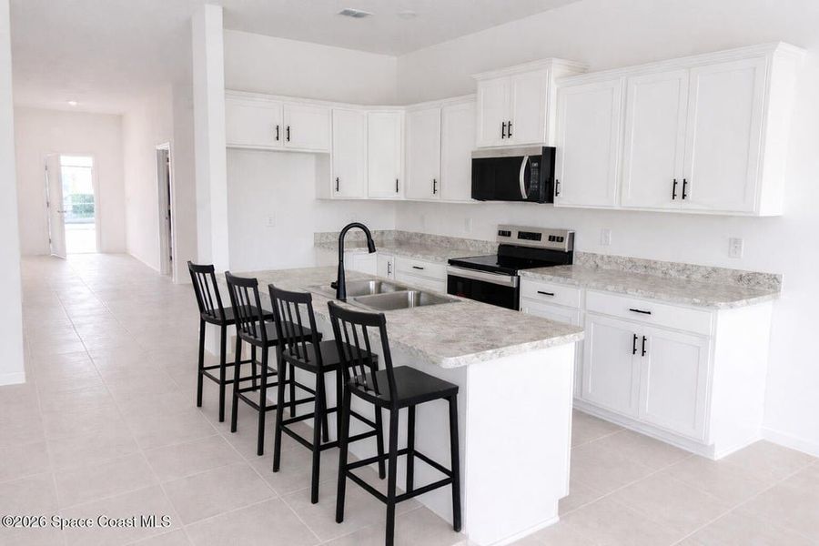 Furnished interior view inside a new home in St. John's Preserve, Palm Bay (Image 6).