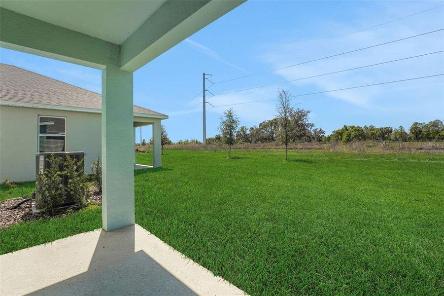 Exterior details and patio area of a home in Willowbrook North, Winter Haven (Image 22).