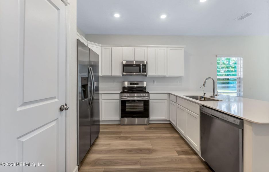 Furnished interior view inside a new home in , Orange Park (Image 12).