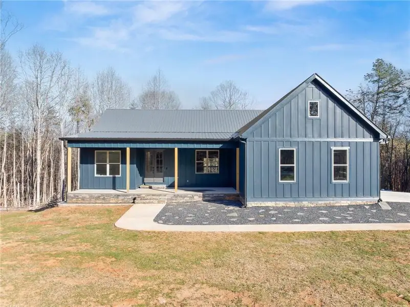 Front exterior of a new home in , Sautee Nacoochee, GA, highlighting curb appeal (Image 1). Front exterior of a new home in , Sautee Nacoochee, GA, highlighting curb appeal (Image 1).