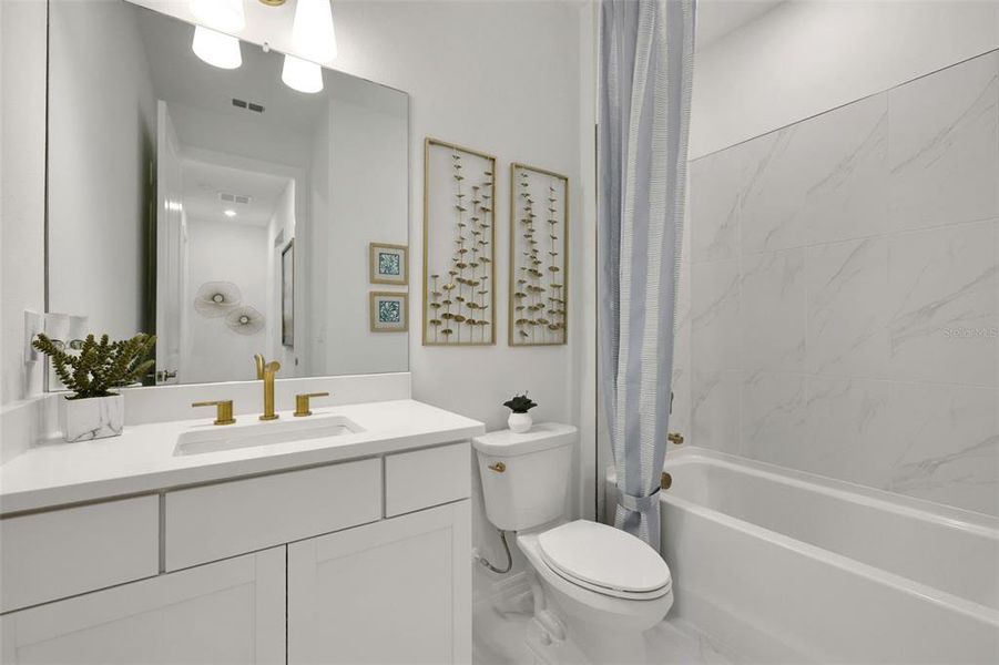 Furnished interior view inside a new home in Creekside Run at Babcock Ranch, Punta Gorda (Image 11).